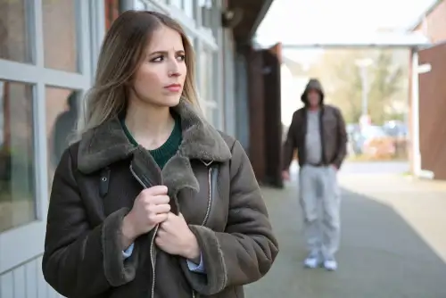 Stalker Following a Woman