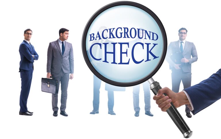 A hand is holding a magnifying glass over the "BACKGROUND CHECK" text with four businessmen standing behind, demonstrating how to investigate potential partners.