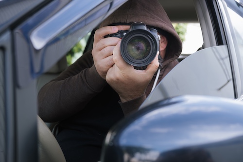 Private Investigator Taking Pictures